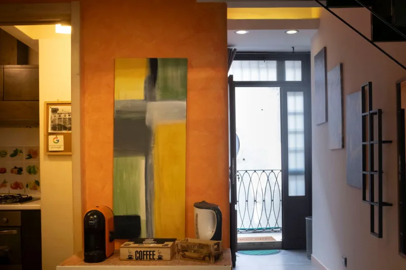 Entrance with coffee corner and balcony door