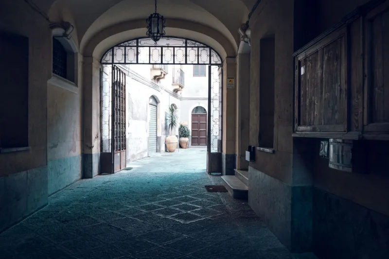Arched entrance passage of the historic building